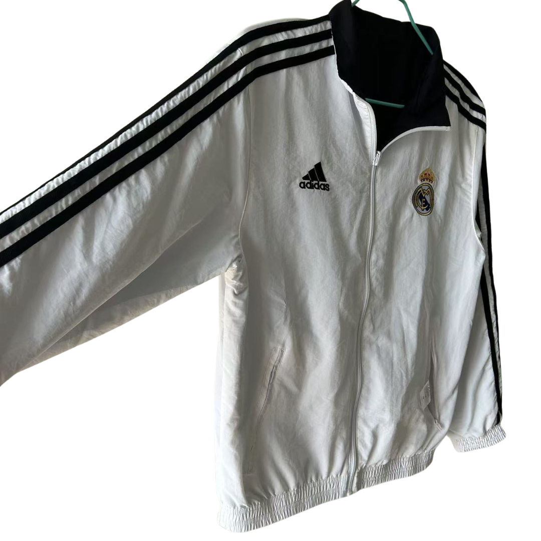 BAJO ENCARGO CHAQUETA REAL MADRID ROMPEVIENTOS REVERSIBLE