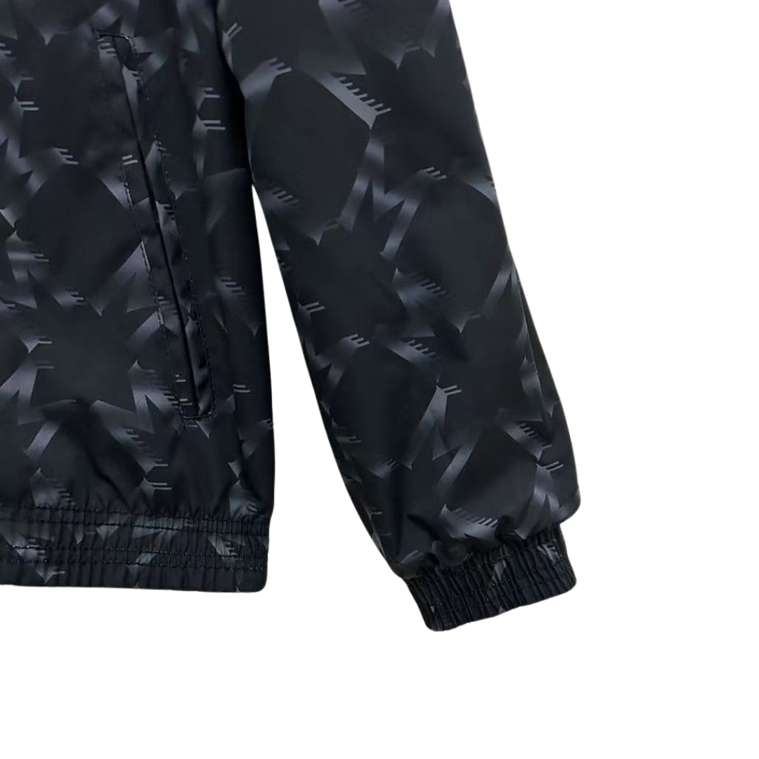 BAJO ENCARGO CHAQUETA MANCHESTER UNITED ROMPEVIENTOS REVERSIBLE