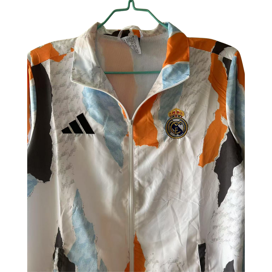 BAJO ENCARGO CHAQUETA REAL MADRID ROMPEVIENTOS