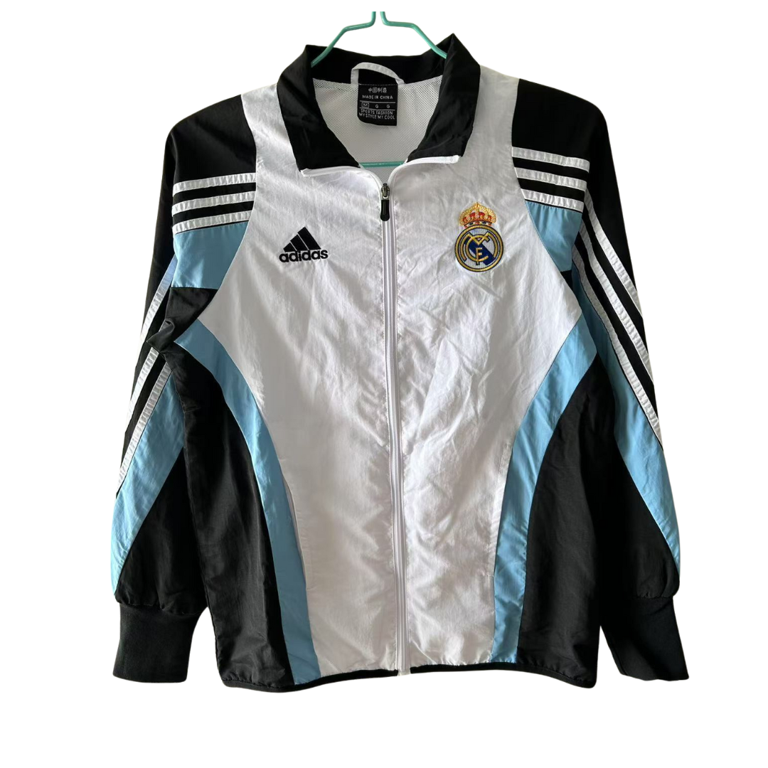 BAJO ENCARGO CHAQUETA REAL MADRID ROMPEVIENTOS