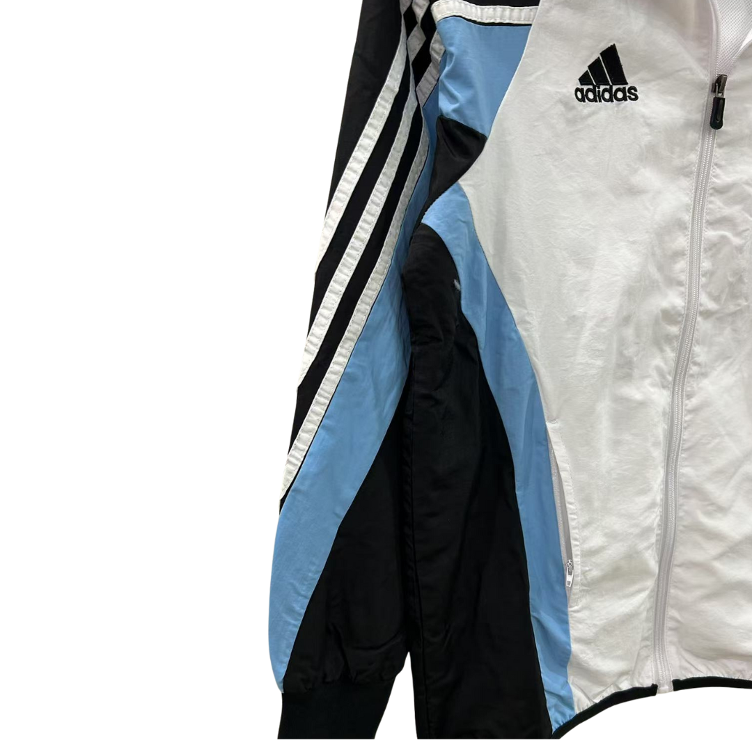 BAJO ENCARGO CHAQUETA REAL MADRID ROMPEVIENTOS