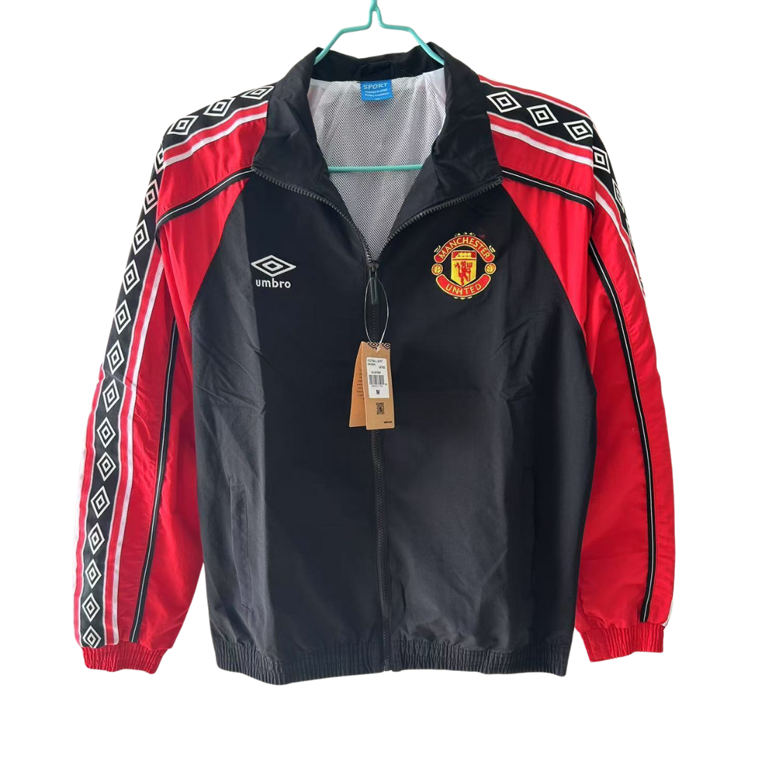 BAJO ENCARGO CHAQUETA MANCHESTER UNITED ROMPEVIENTOS
