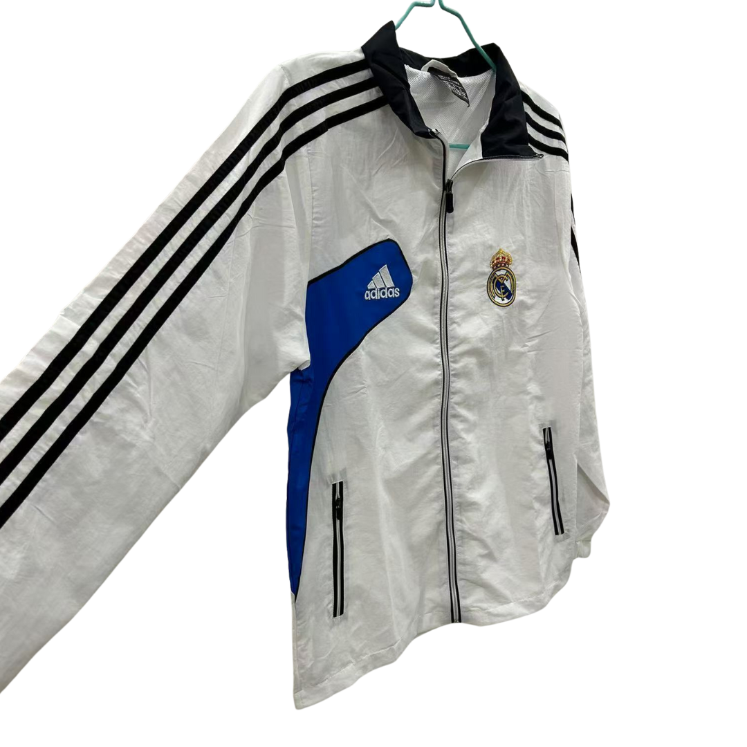 BAJO ENCARGO CHAQUETA REAL MADRID ROMPEVIENTOS