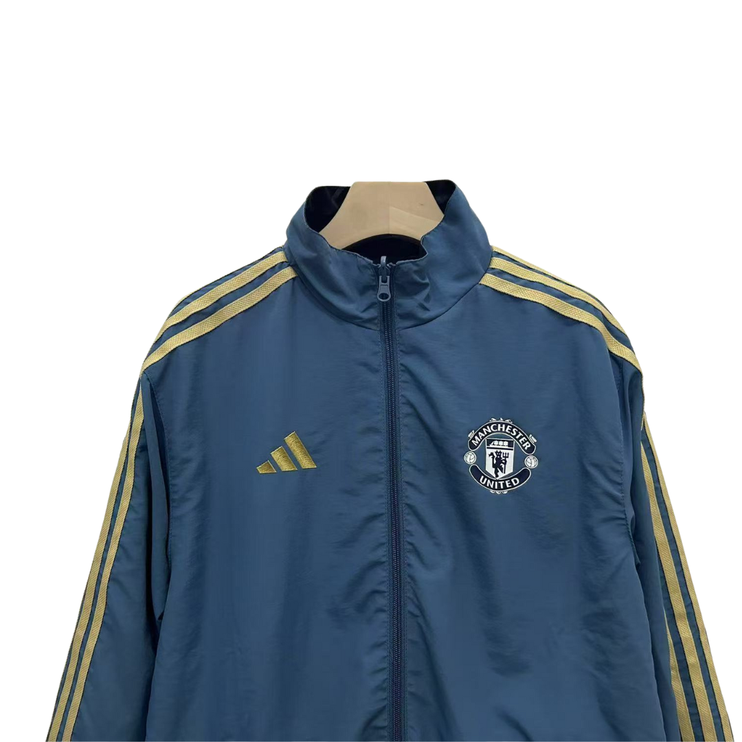 BAJO ENCARGO CHAQUETA MANCHESTER UNITED ROMPEVIENTOS REVERSIBLE