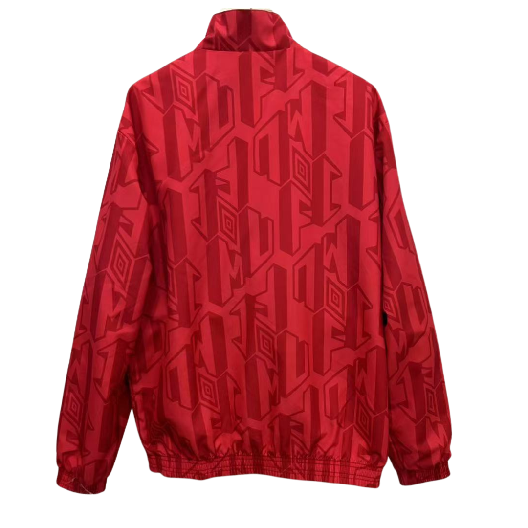 BAJO ENCARGO CHAQUETA MANCHESTER UNITED ROMPEVIENTOS REVERSIBLE