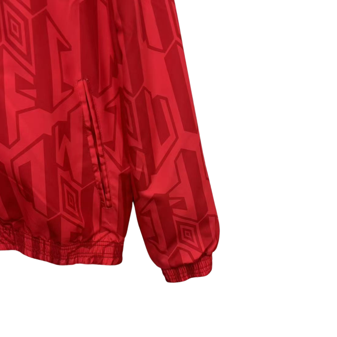 BAJO ENCARGO CHAQUETA MANCHESTER UNITED ROMPEVIENTOS REVERSIBLE